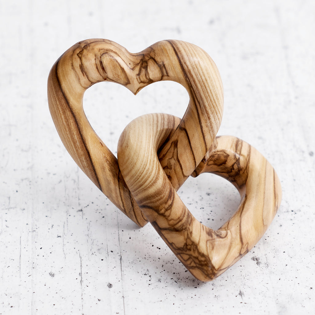 Intertwined olive wood hearts - handcrafted creation