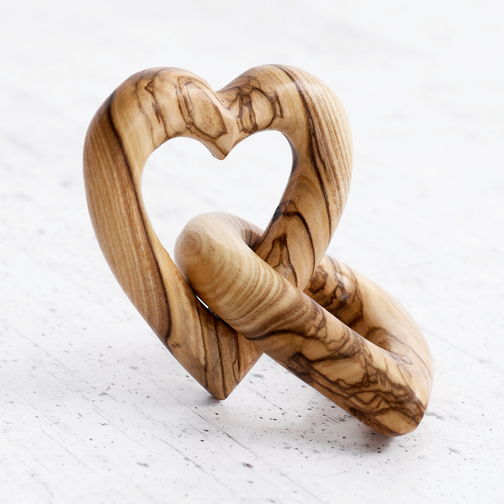 Intertwined olive wood hearts - handcrafted creation