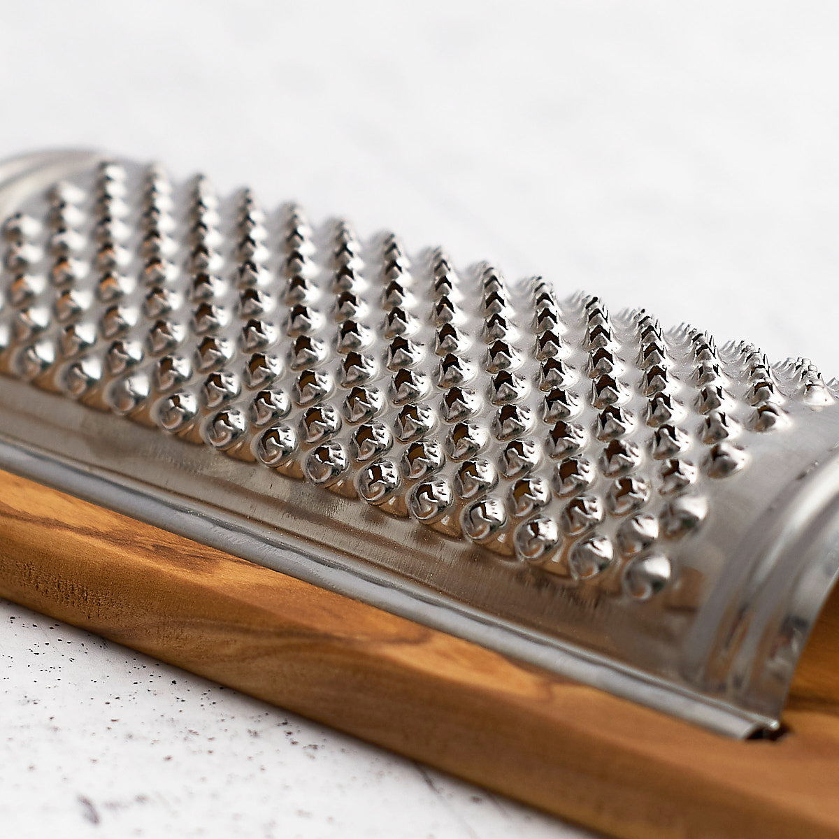 Flat olive wood grater