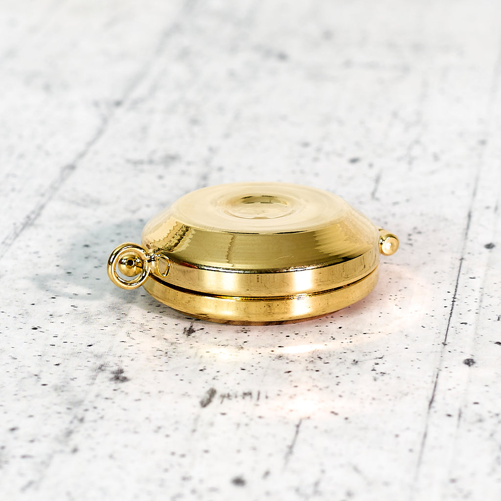 Pyx for hosts in olive wood and gilded metal